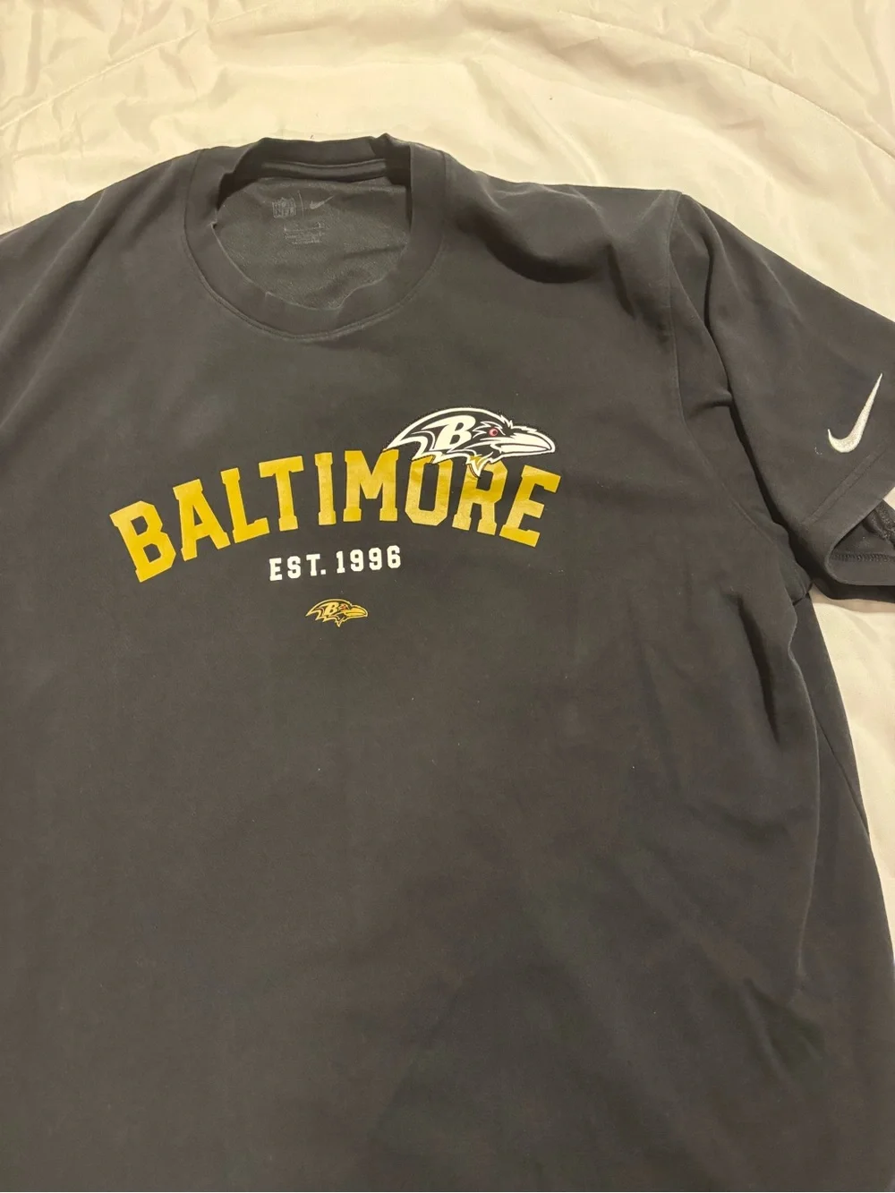 Nike Black Baltimore Ravens Short Sleeve Graphic Tee with Gold Accent EST 1996